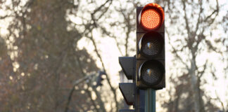 Self-driving robotic vehicles are communicating with traffic lights on the streets of Sydney, as part of an intelligent transport trial.